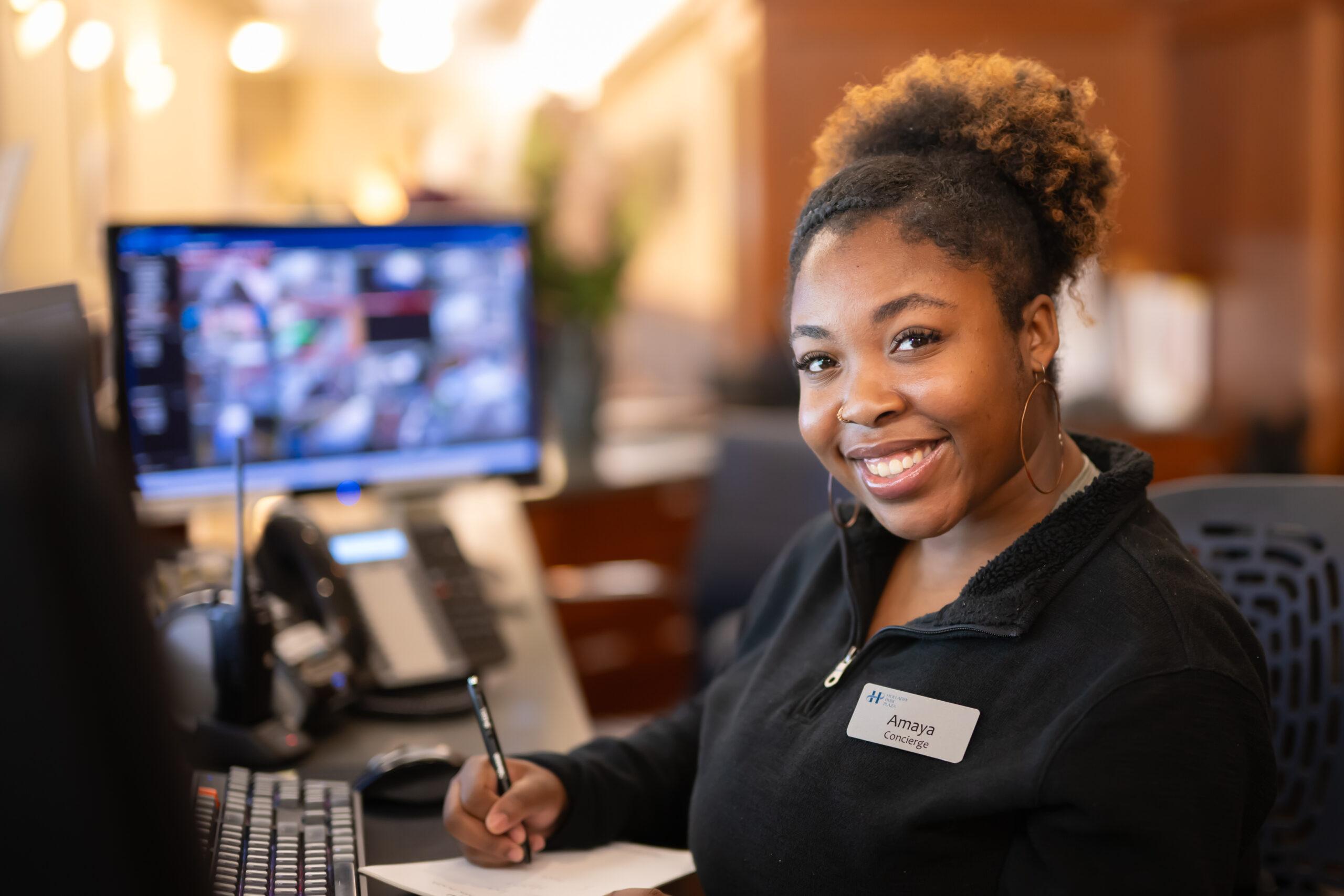 Close-up portrait of Amaya, a Holladay Park Plaza concierge.