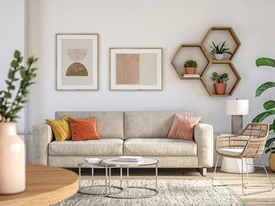 A furnished residence at Holladay Park Plaza. There are several plants and colorful accents throughout the space.